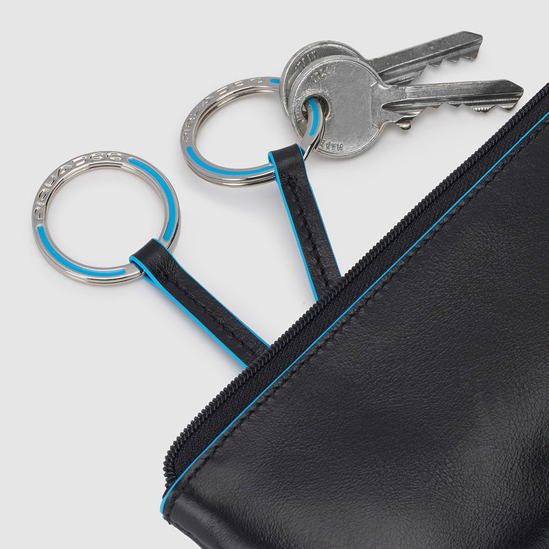 Two-ring key case with zipped rear pocket