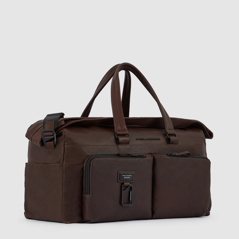 Duffel bag with trolley strap