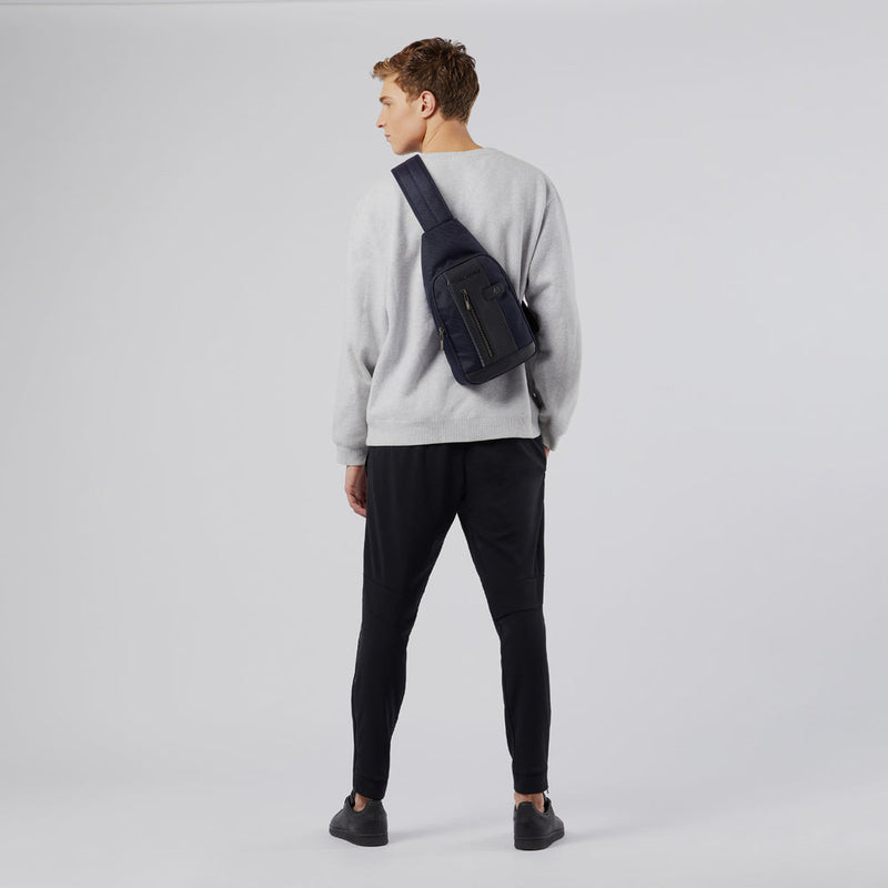 Sling bag in recycled fabric with LED light
