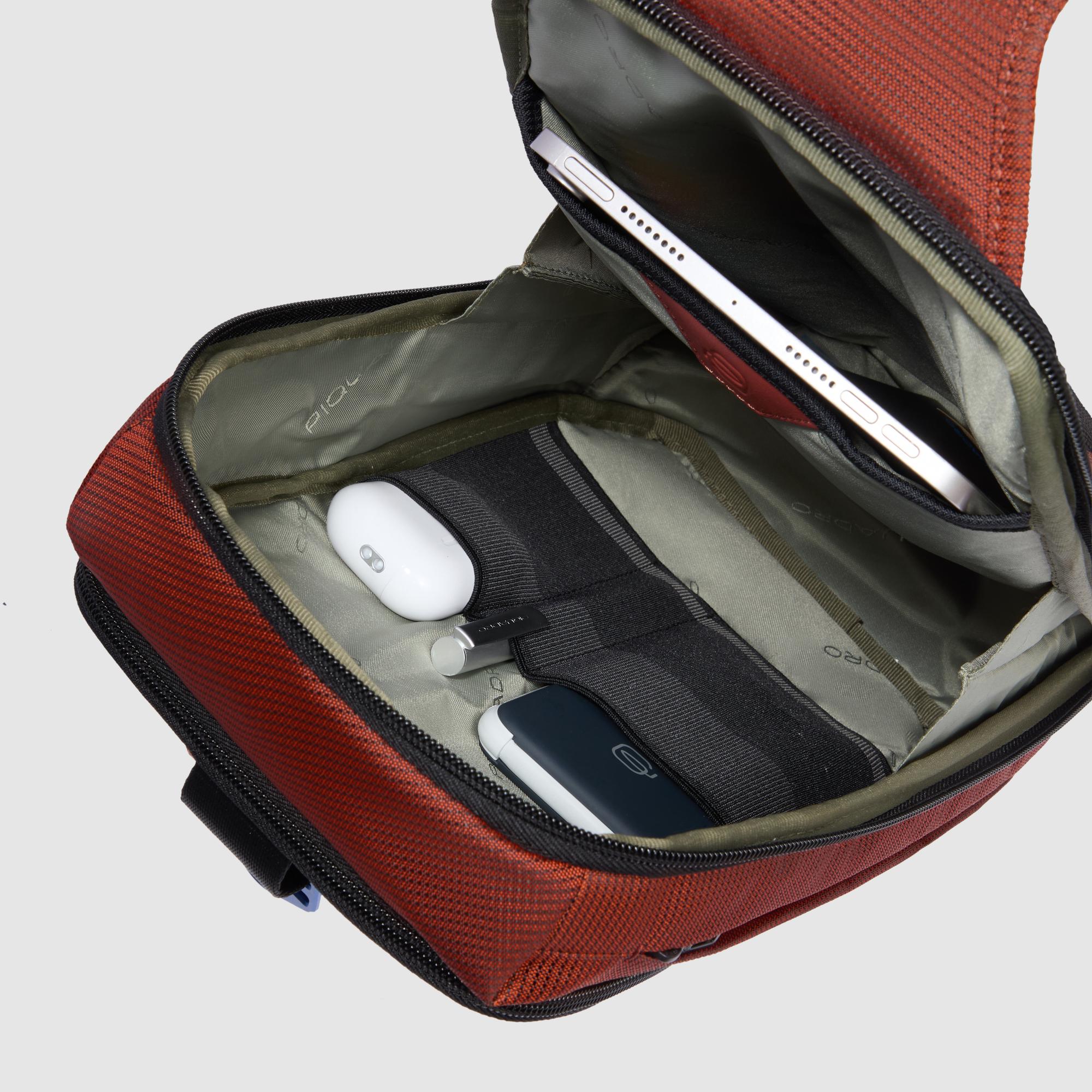 ipad mini being stored in a sling backpack RFID Bag for Recycled Textile - orange Autism awareness fishing reel aid kit and supply Schulranzen Color + Bundle:Electric Navy Getaway Bag