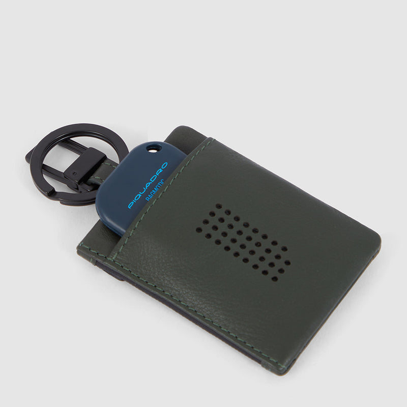 Keychain with CONNEQU and side zipped pocket