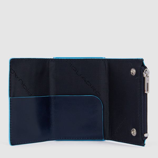 Compact wallet with sliding system and coin pocket