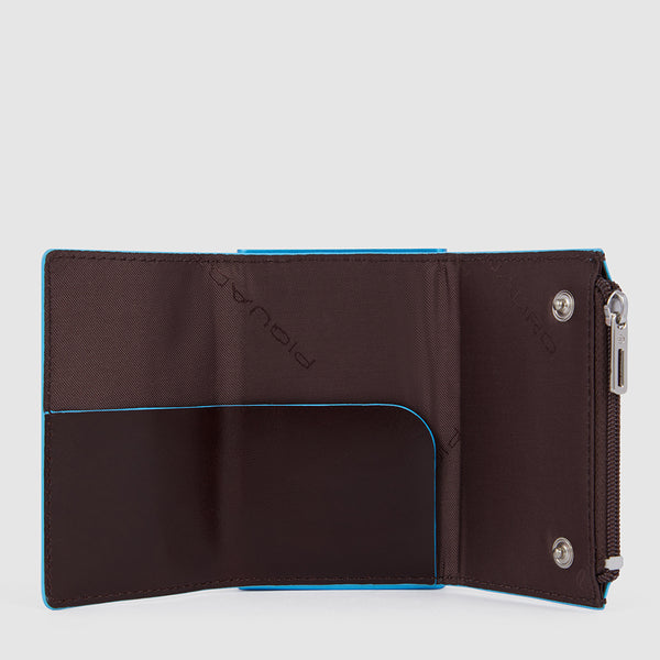 Compact wallet with sliding system and coin pocket