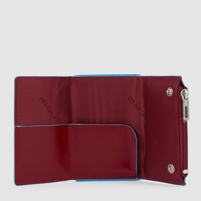 Compact wallet with sliding system and coin pocket