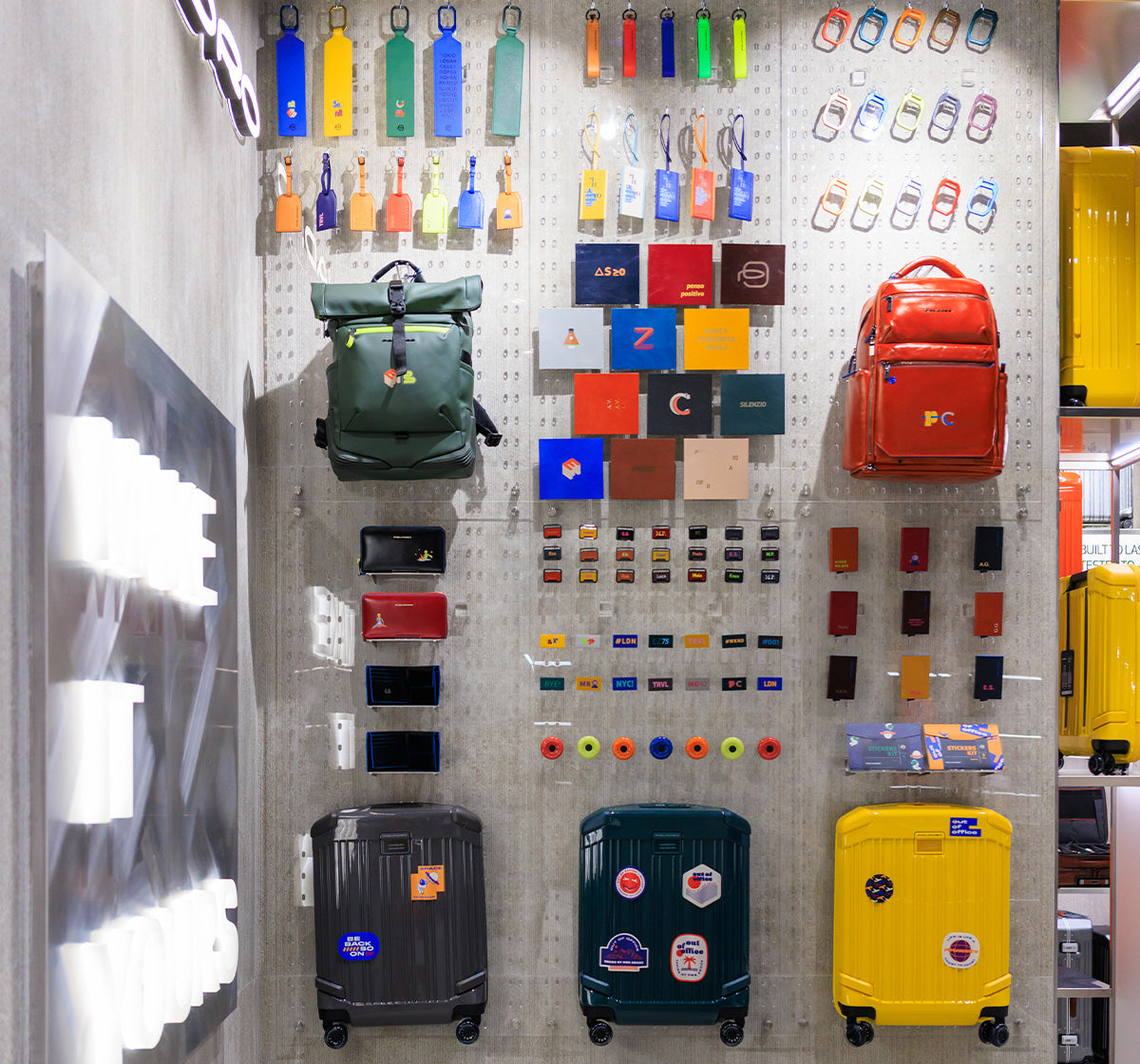 Piquadro store with backpacks and suitcases on the shelves